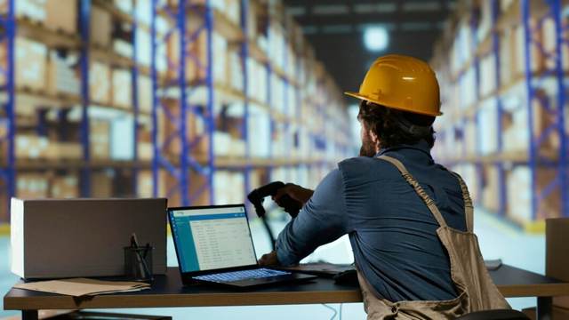 Warehouse worker managing inventory